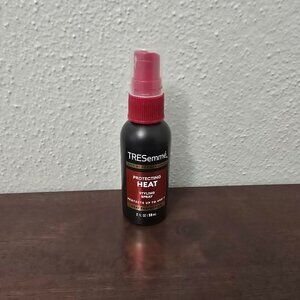 TRESemme STYLING SPRAY. NEW  2.OZ